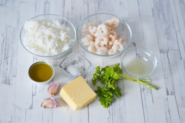 Кальмары фаршированные креветками с сыром и рисом